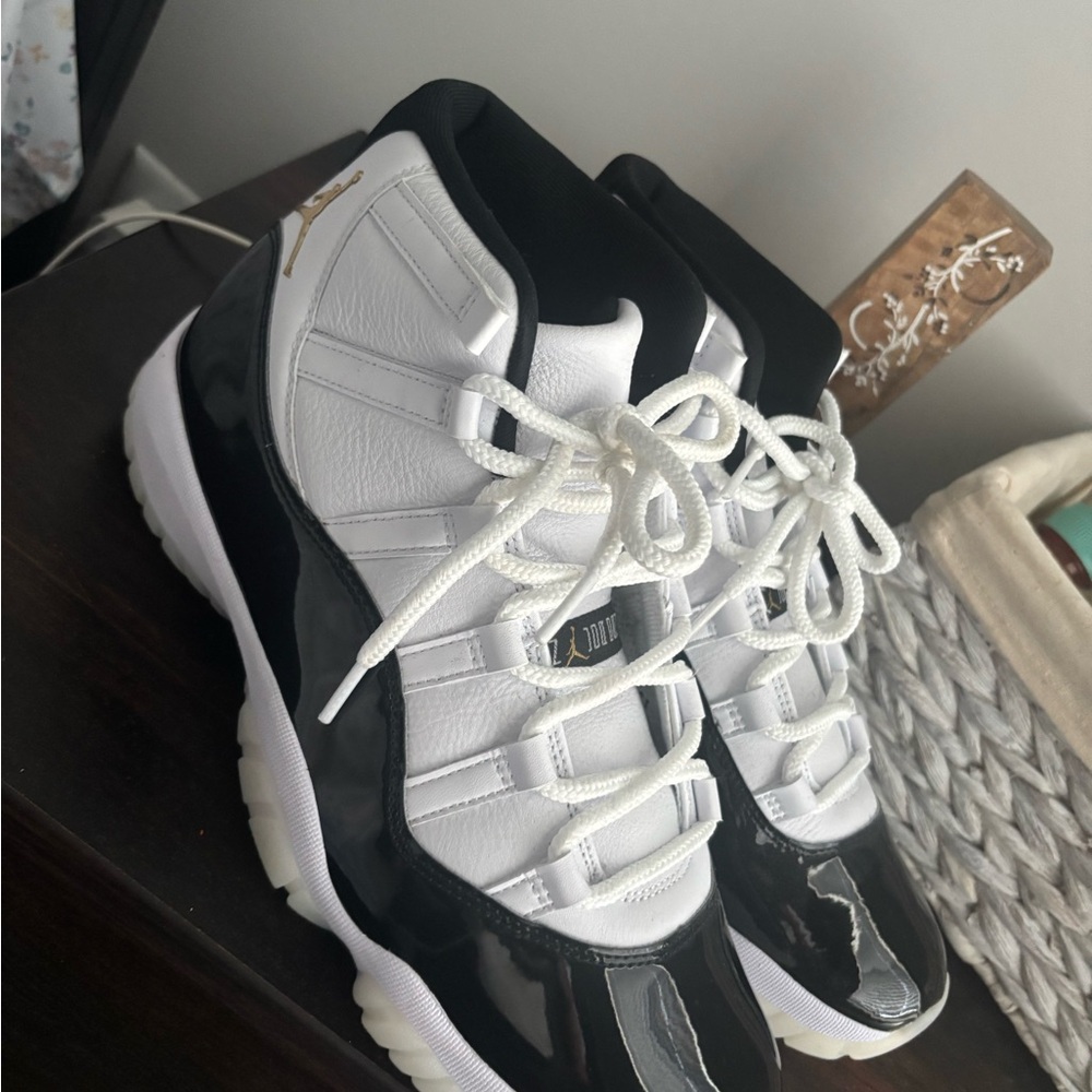 Nike Air Jordan 11 Retro Black White Gold Sneakers